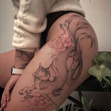 Tatuajes femeninos en los muslos