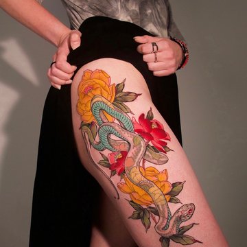 Tatuajes femeninos en los muslos