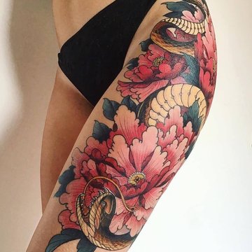 Tatuajes femeninos en los muslos